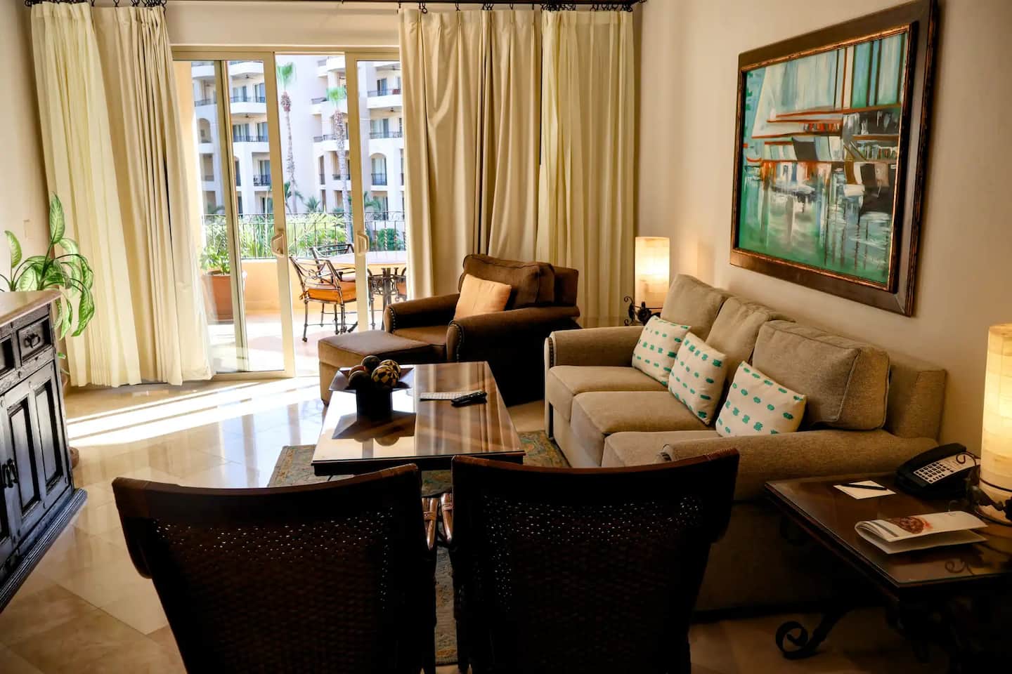 Bright living room in Villa 1306 opening to the private terrace